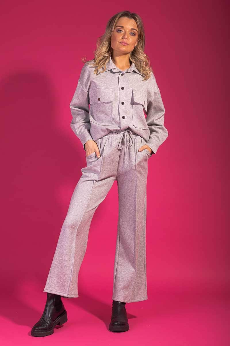 grey pintucked pants