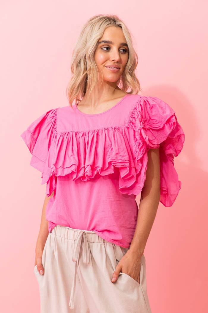 pink frilly top