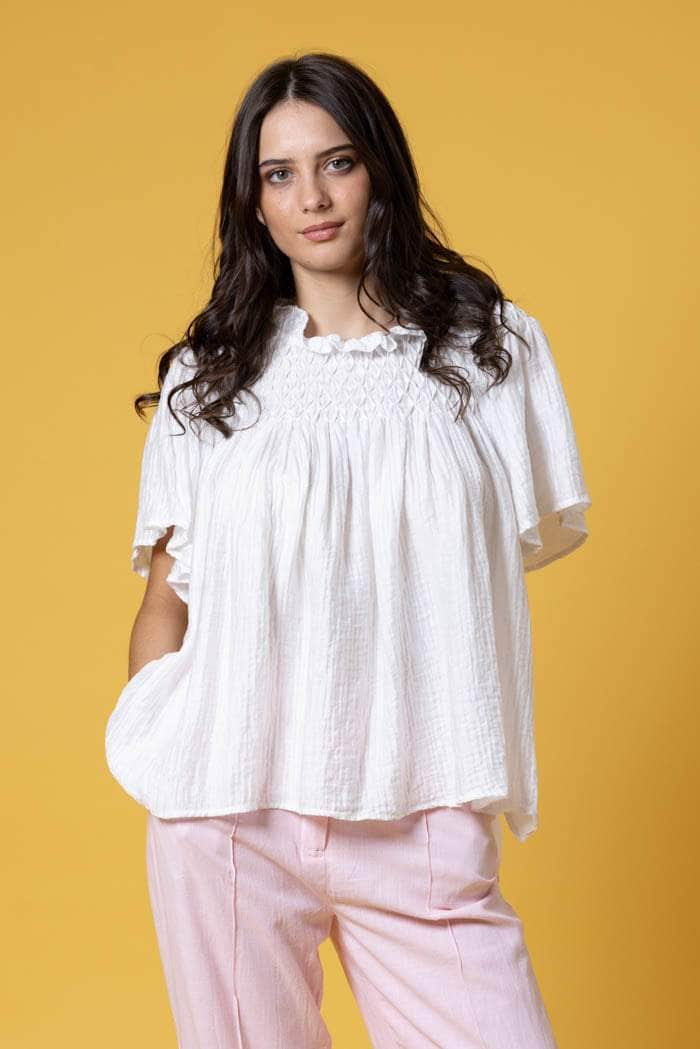 white blouse top smocked