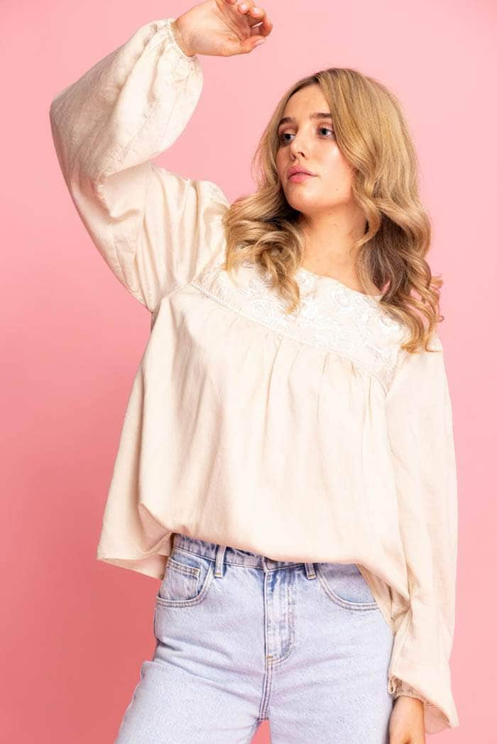 beige top long sleeves