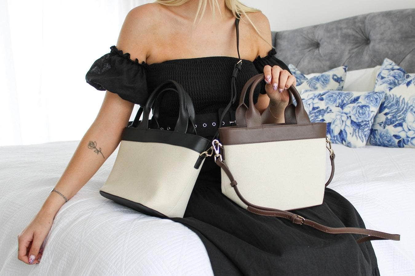 Cream canvas handbag with black straps