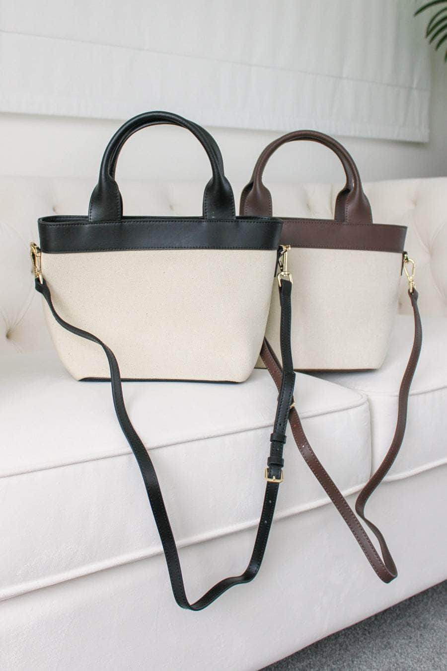 Cream canvas handbag with black straps