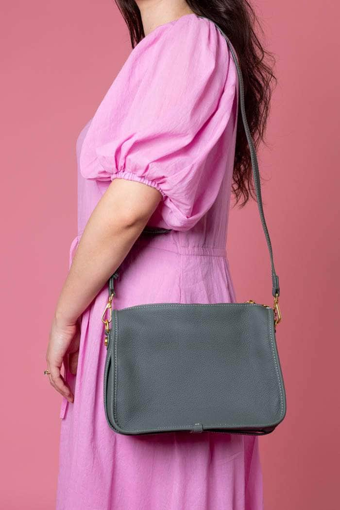 green leather handbag