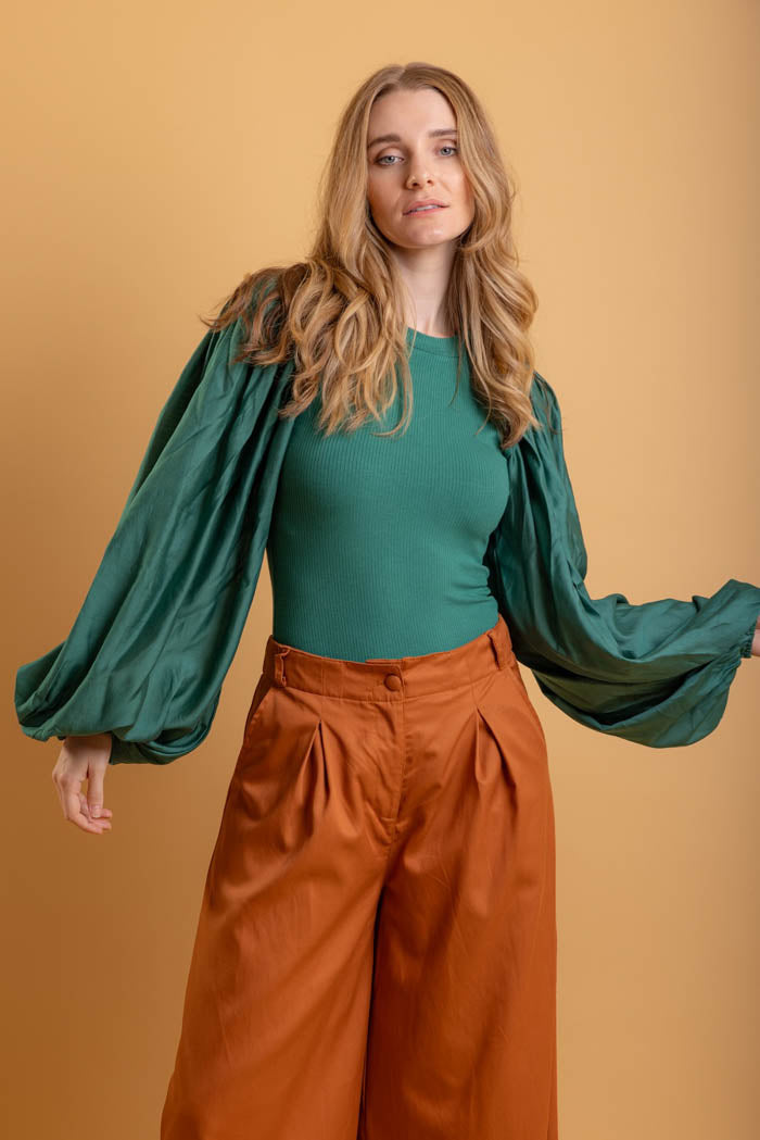 green long sleeve top