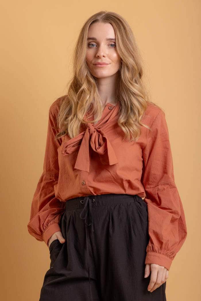 rust pussy bow blouse